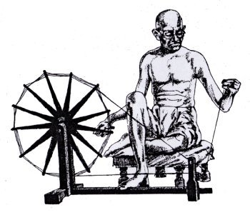 Gandhiji with his spinning wheel.