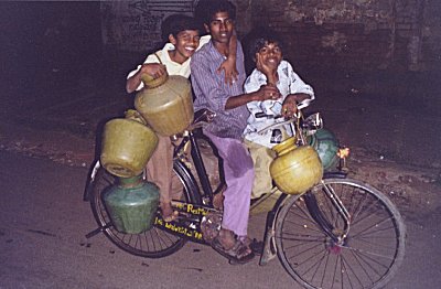 Boys Transporting Water