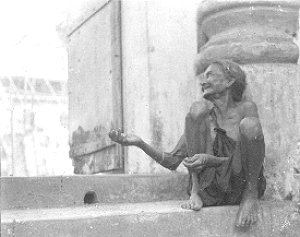 A beggar at the Mangeshi temple, Goa