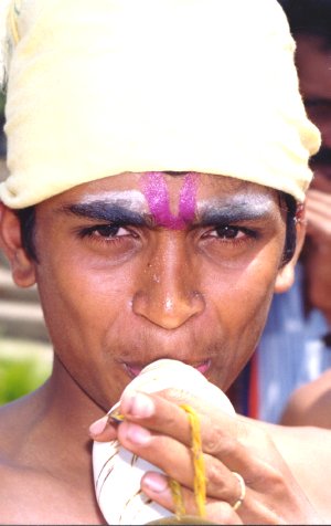 Beggar with a Conch  
