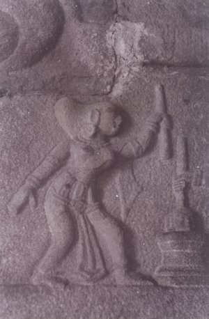 Woman with a Pestle at Mortar