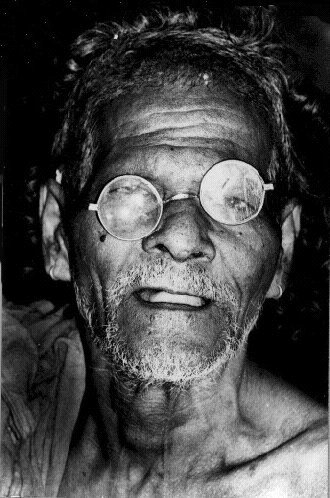 Halakki Tribal man in broken eye glasses