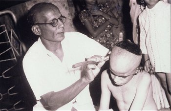 Shaving of Head during a Monkhood Ceremony