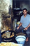 Man Frying Fritters