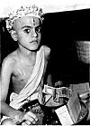 A Brahmin Vatu (student)  begs his first meal  <I>Upanayanam </I>