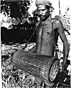 A  drummer of the Santhal tribe, West Bengal