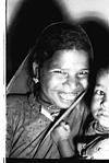 A shy and laughing gonda woman