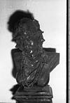 A metal model of a fully ornamented tribal women