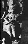 A sculpture of a musician playing stringed instrument, 1985