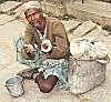 A Patient of Leprosy Begging on the Streets